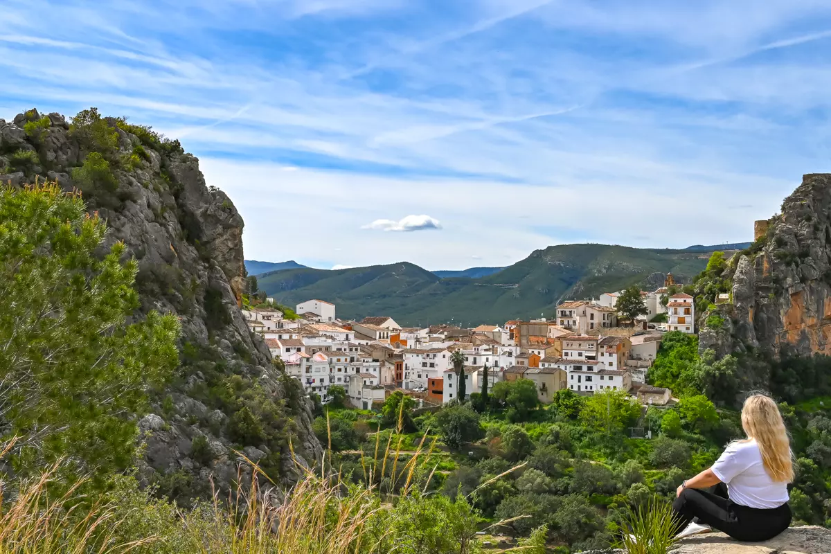 View of Chulilla from above, with whitewashed houses nestled among cliffs