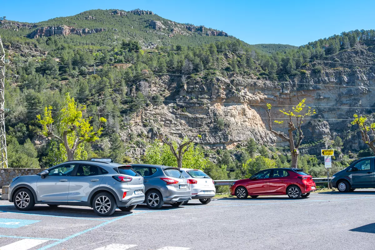 Designated parking area near Montanejos Hot Springs with mountain views.