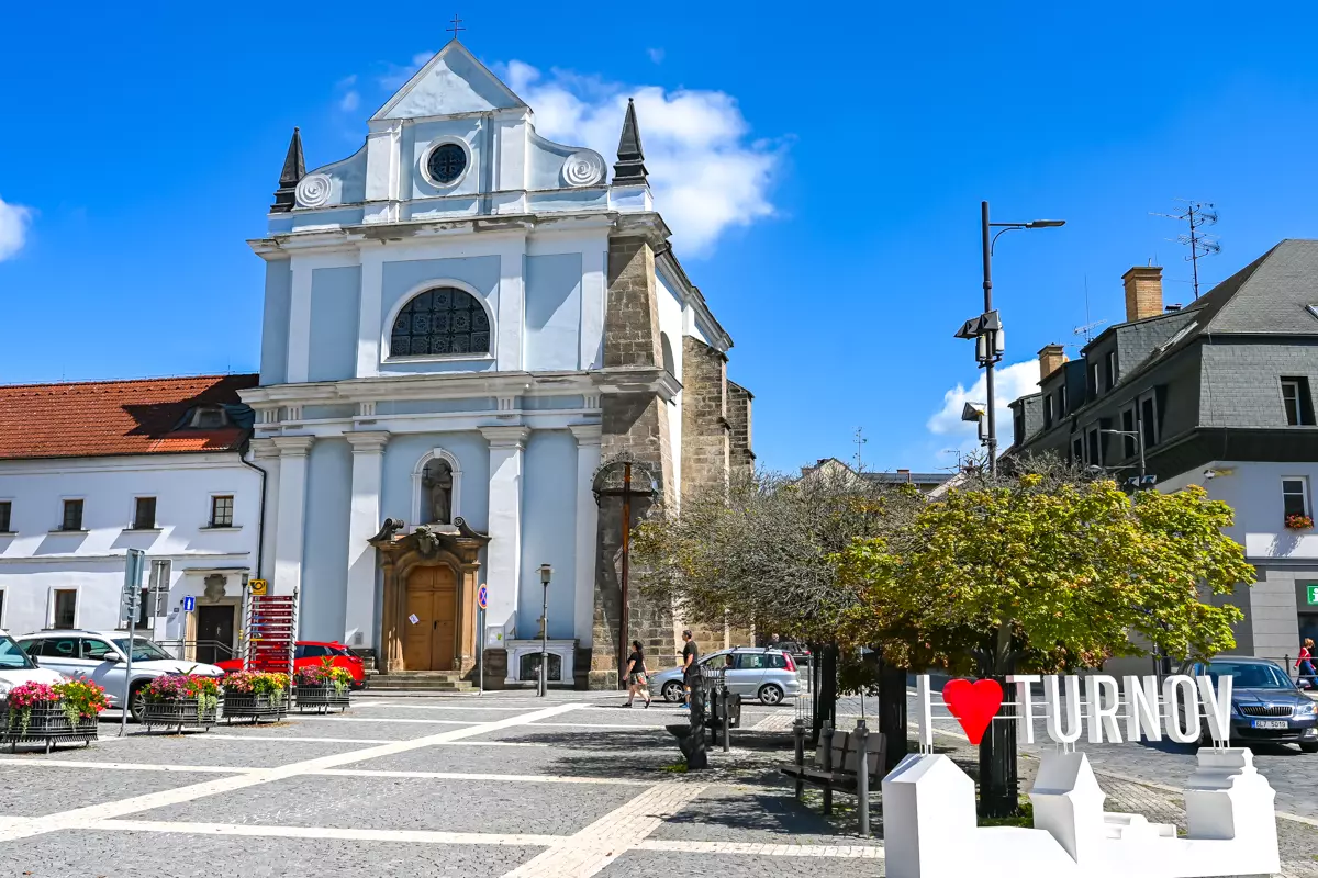 Central square of Turnov town with historic buildings