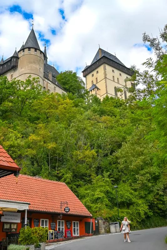 Karlštejn Castle rising above the street
