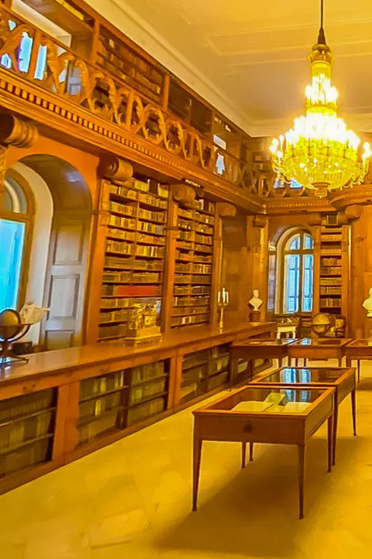 Wooden bookshelves and antique interior of the Festetics Palace library