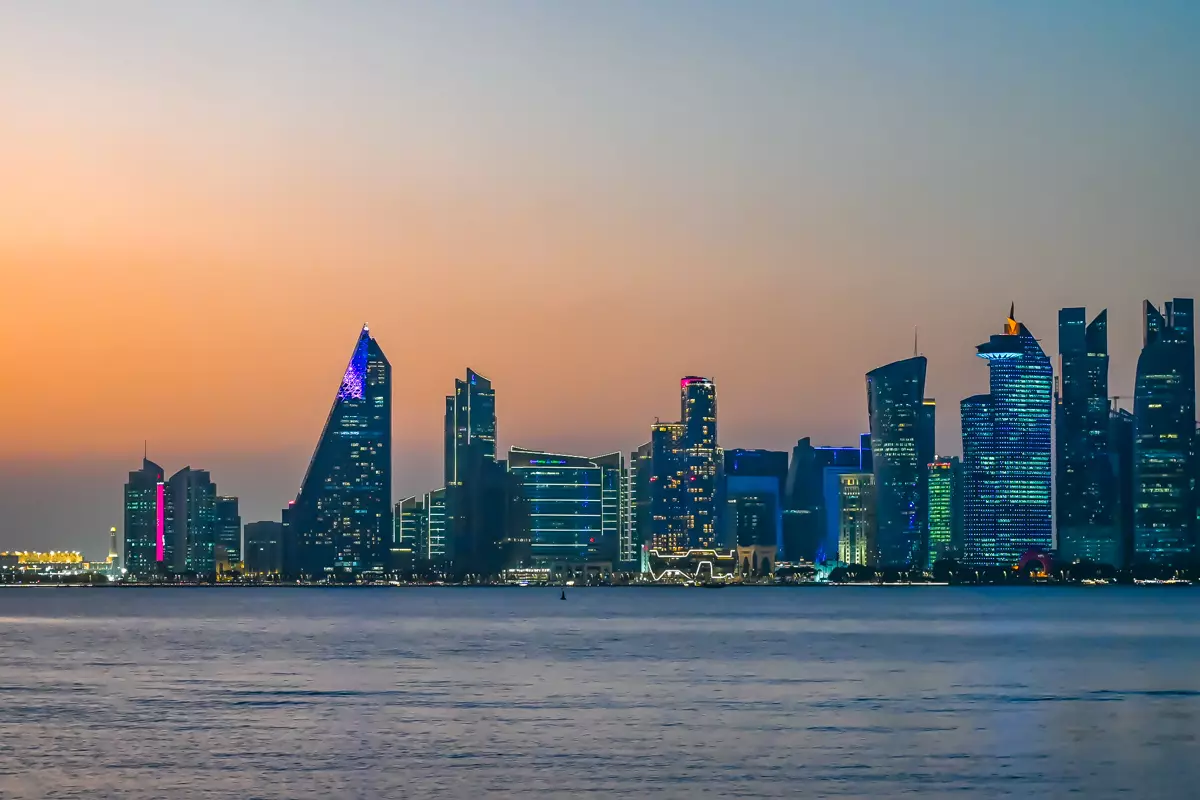 Doha skyline at sunset viewed from the waterfront