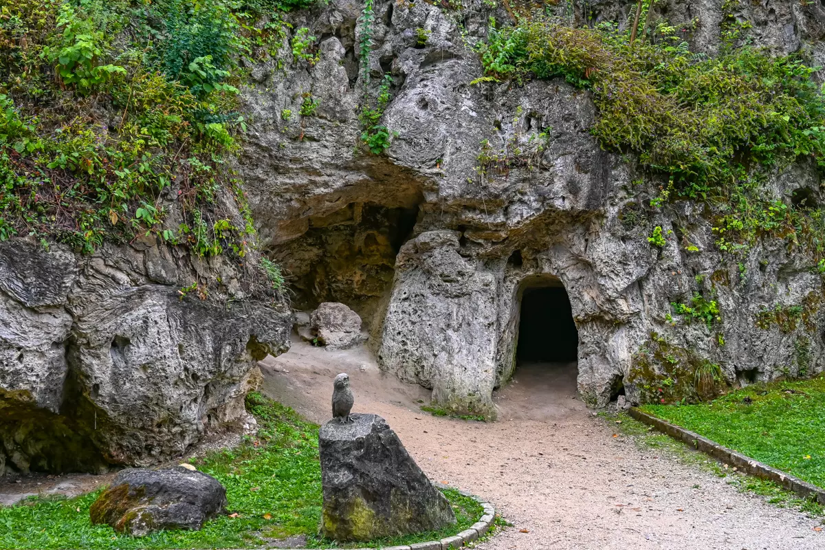 Natural rock caves in Lillafüred surrounded by greenery.